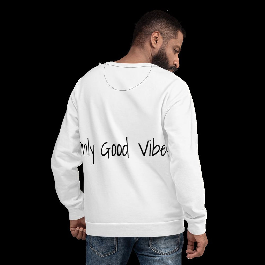 A man wearing a white sweatshirt with the text "Only Good Vibes" printed on the back.